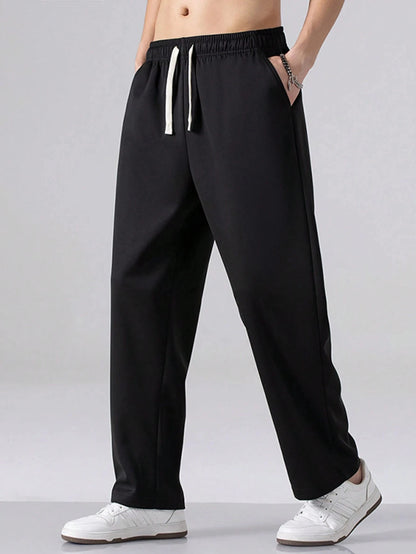 Men's Regular Fit Solid Color Drawstring Waist Sports Pants Autumn and Winter Casual Pocket Design Pants Men's Daily Trousers