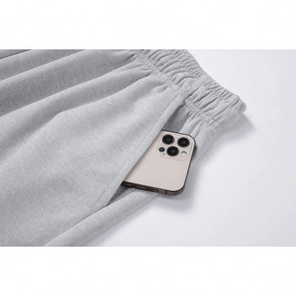 Men's Regular Fit Solid Color Drawstring Waist Sports Pants Autumn and Winter Casual Pocket Design Pants Men's Daily Trousers