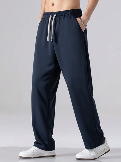 Men's Regular Fit Solid Color Drawstring Waist Sports Pants Autumn and Winter Casual Pocket Design Pants Men's Daily Trousers